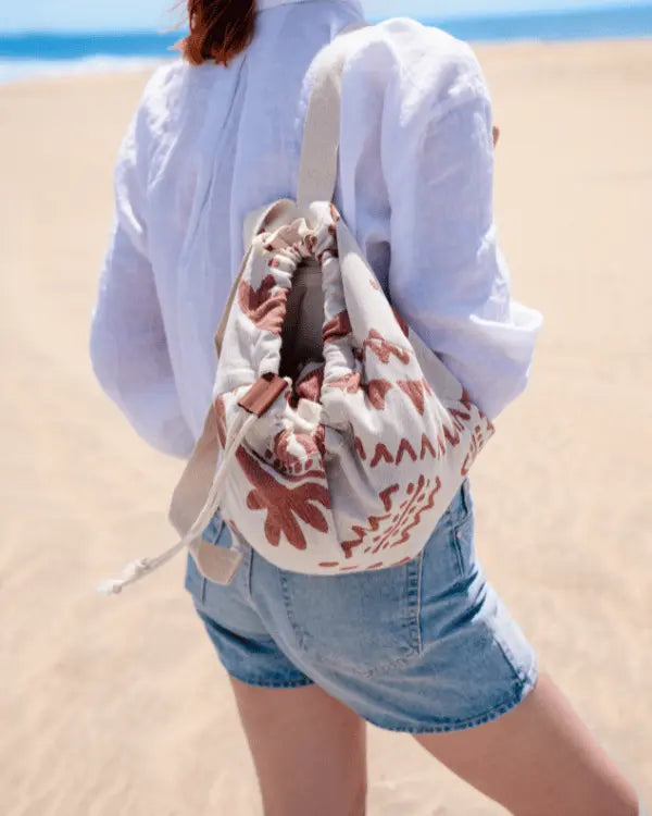 The 2-in-1 Beach Towel Backpack: Fold, Cinch, and Go Anywhere!